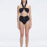 "Model wearing the Meredith Black Halter Neck Bikini Set with buckle detail and removable padding.
