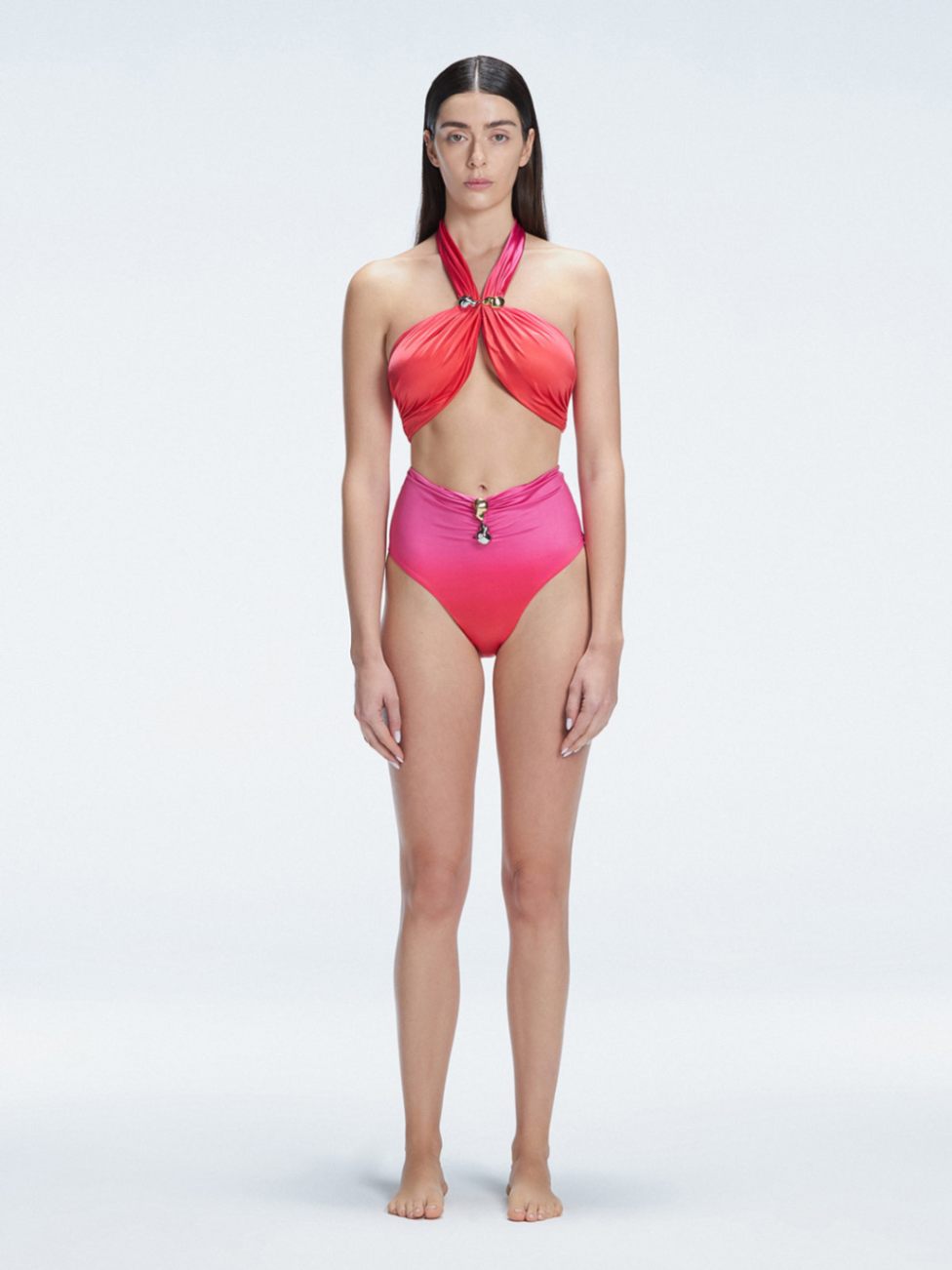 "Model wearing the Meredith Gradient Halter Neck Bikini Set with buckle detail and removable padding, standing by the pool."
