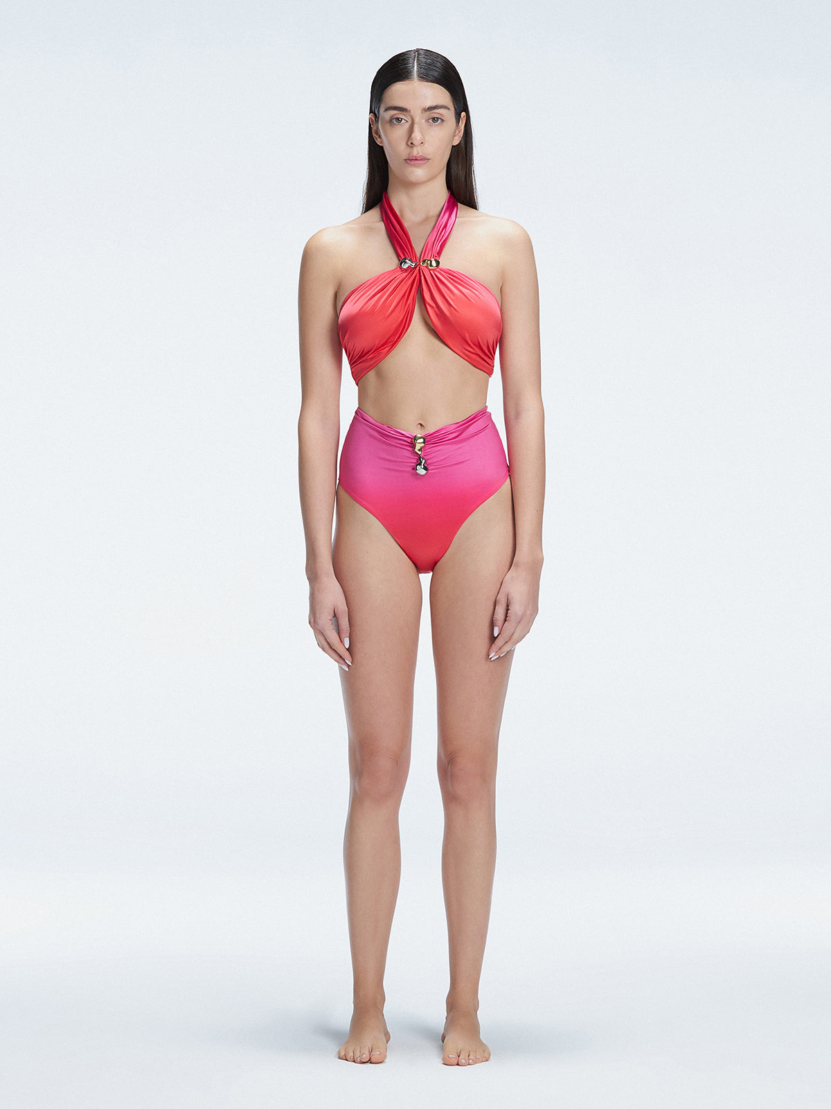 "Model wearing the Meredith Gradient Halter Neck Bikini Top with buckle detail and removable padding, standing by the pool."
