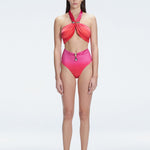 "Model wearing the Meredith Gradient Halter Neck Bikini Bottom with buckle detail and removable padding, standing by the pool."
