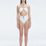 "Model wearing the Meredith White Halter Neck Bikini Set with buckle detail and removable padding "
