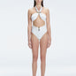 "Model wearing the Meredith White Halter Neck Bikini Set with buckle detail and removable padding "
