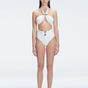 "Model wearing the Meredith White Halter Neck Bikini Set with buckle detail and removable padding "
