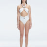 "Model wearing the Meredith White Halter Neck Bikini Set with buckle detail and removable padding "
