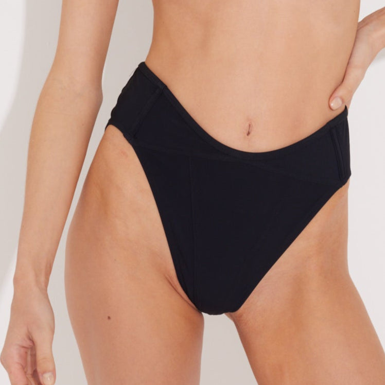 Como Black High Waist Solid Bikini Bottom | Moeva | Bikini Bottom | Each week unveils new pieces—luxury swimwear, fluid resort silhouettes, and elevated summer-to-evening essentials designed to carry you from coastal escapes to city nights.