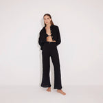 Aura Black High Waist Beach Pants | Moeva | Pants | Each week unveils new pieces—luxury swimwear, fluid resort silhouettes, and elevated summer-to-evening essentials designed to carry you from coastal escapes to city nights.