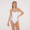 Ninetta White Scoop Neck Swimsuit | Moeva | Swimsuit | Each week unveils new pieces—luxury swimwear, fluid resort silhouettes, and elevated summer-to-evening essentials designed to carry you from coastal escapes to city nights.