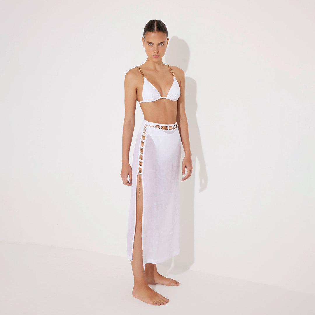 Maritza White Sheer High-Rise Skirt with Gold Chain Belt | Moeva | Beachwear Skirts | Each week unveils new pieces—luxury swimwear, fluid resort silhouettes, and elevated summer-to-evening essentials designed to carry you from coastal escapes to city nights.