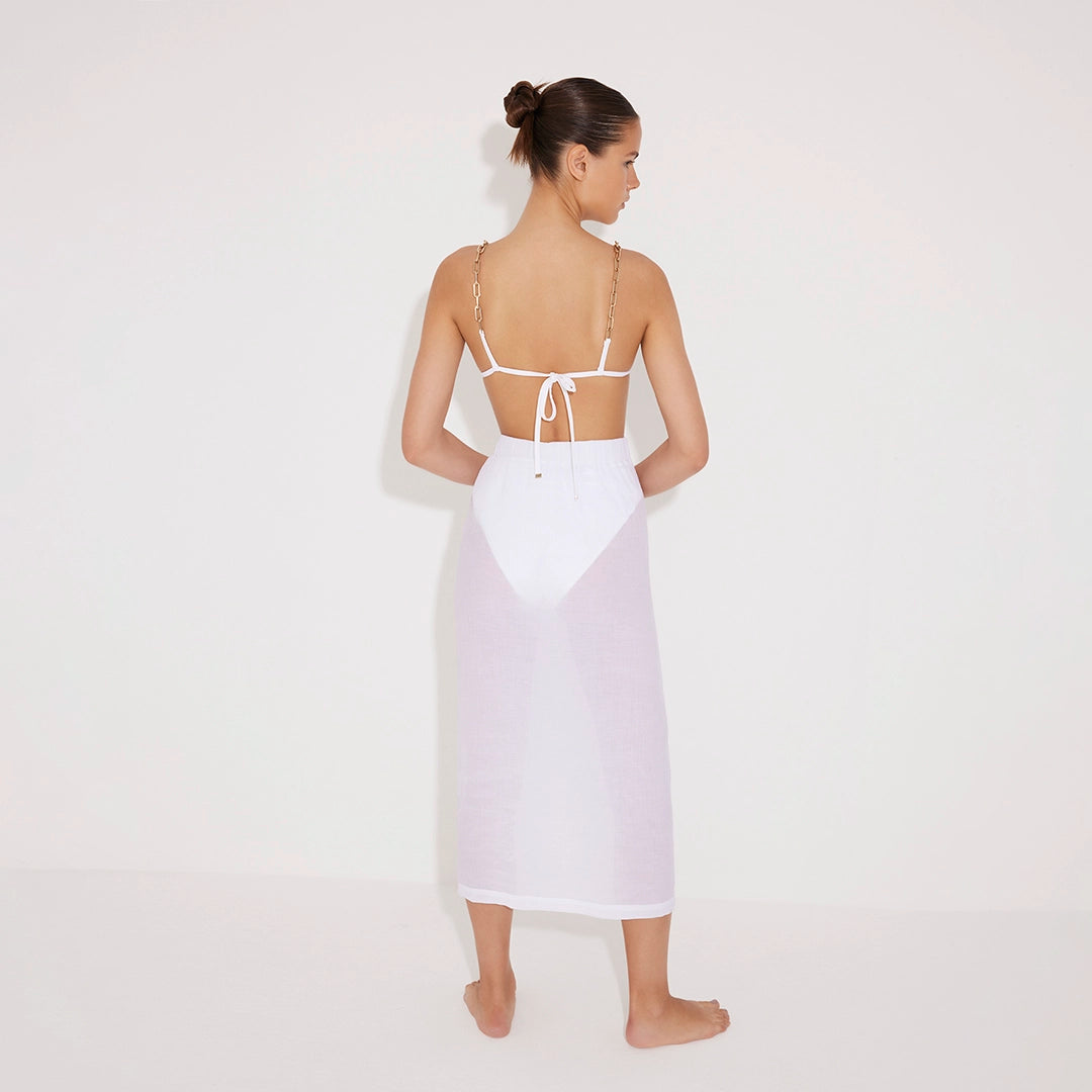 Maritza White Sheer High-Rise Skirt with Gold Chain Belt | Moeva | Beachwear Skirts | Each week unveils new pieces—luxury swimwear, fluid resort silhouettes, and elevated summer-to-evening essentials designed to carry you from coastal escapes to city nights.