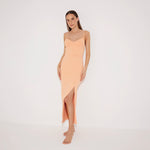 Beau Orange Sleeveless Knitted Long Dress with Side Slit | Moeva | RTW Dresses | Each week unveils new pieces—luxury swimwear, fluid resort silhouettes, and elevated summer-to-evening essentials designed to carry you from coastal escapes to city nights.