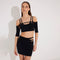 Ontario Black Knitted Cut-Out Skirt | Moeva | Beachwear Skirts | Each week unveils new pieces—luxury swimwear, fluid resort silhouettes, and elevated summer-to-evening essentials designed to carry you from coastal escapes to city nights.