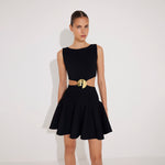 Lanao Black Cut-Out Knit Mini Dress with Gold Detail | Moeva | RTW Dresses | Each week unveils new pieces—luxury swimwear, fluid resort silhouettes, and elevated summer-to-evening essentials designed to carry you from coastal escapes to city nights.