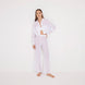 Jacinta White Cropped Sheer Long Sleeve Shirt and Aura White High Waist Beach Pants | Moeva | Shirt and Pants | Each week unveils new pieces—luxury swimwear, fluid resort silhouettes, and elevated summer-to-evening essentials designed to carry you from coastal escapes to city nights.