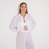 Jacinta White Cropped Sheer Long Sleeve Shirt and Aura White High Waist Beach Pants | Moeva | Shirt and Pants | Each week unveils new pieces—luxury swimwear, fluid resort silhouettes, and elevated summer-to-evening essentials designed to carry you from coastal escapes to city nights.