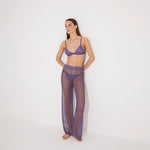 Luz Lilac Metallic Sheer Knit Pants | Moeva | Women Beachwear Pants | Each week unveils new pieces—luxury swimwear, fluid resort silhouettes, and elevated summer-to-evening essentials designed to carry you from coastal escapes to city nights.