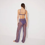 Luz Lilac Metallic Sheer Knit Pants | Moeva | Women Beachwear Pants | Each week unveils new pieces—luxury swimwear, fluid resort silhouettes, and elevated summer-to-evening essentials designed to carry you from coastal escapes to city nights.