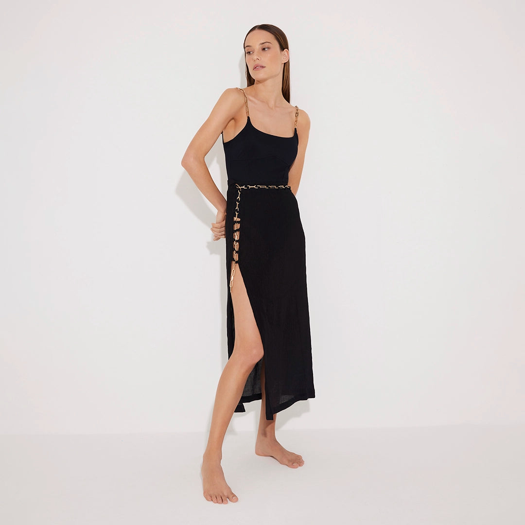 Maritza Black Sheer High-Rise Skirt with Gold Chain Belt | Moeva | Beachwear Skirts | Each week unveils new pieces—luxury swimwear, fluid resort silhouettes, and elevated summer-to-evening essentials designed to carry you from coastal escapes to city nights.
