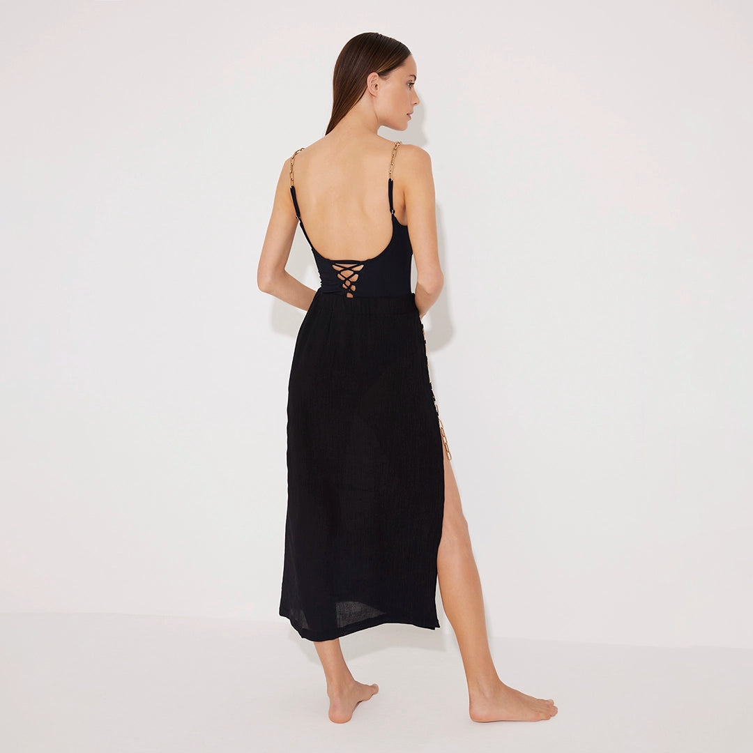 Maritza Black Sheer High-Rise Skirt with Gold Chain Belt | Moeva | Beachwear Skirts | Each week unveils new pieces—luxury swimwear, fluid resort silhouettes, and elevated summer-to-evening essentials designed to carry you from coastal escapes to city nights.