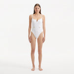 Muriel White Scoop Neck Textured Swimsuit | Moeva | Swimsuit | Each week unveils new pieces—luxury swimwear, fluid resort silhouettes, and elevated summer-to-evening essentials designed to carry you from coastal escapes to city nights.