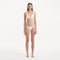 Salila White Underwired Side Tie Wave Textured Bikini Set | Moeva | | Each week unveils new pieces—luxury swimwear, fluid resort silhouettes, and elevated summer-to-evening essentials designed to carry you from coastal escapes to city nights.