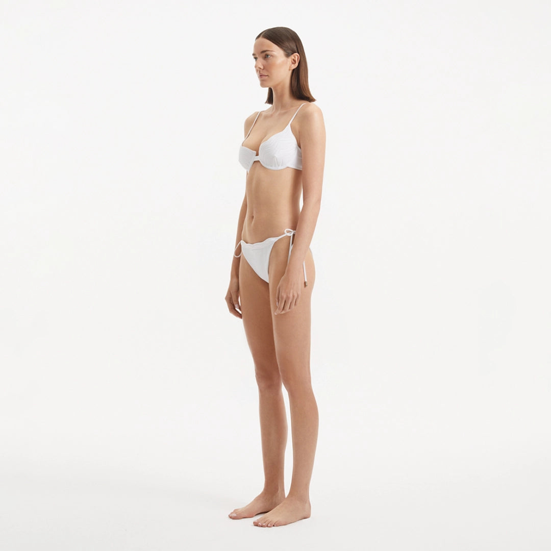 Salila White Underwired Side Tie Wave Textured Bikini Set | Moeva | Bikini Set | Each week unveils new pieces—luxury swimwear, fluid resort silhouettes, and elevated summer-to-evening essentials designed to carry you from coastal escapes to city nights.