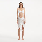 Raiden White Tie Front Wavy-Trim Sheer Sarong | Moeva | Sarongs | Each week unveils new pieces—luxury swimwear, fluid resort silhouettes, and elevated summer-to-evening essentials designed to carry you from coastal escapes to city nights.