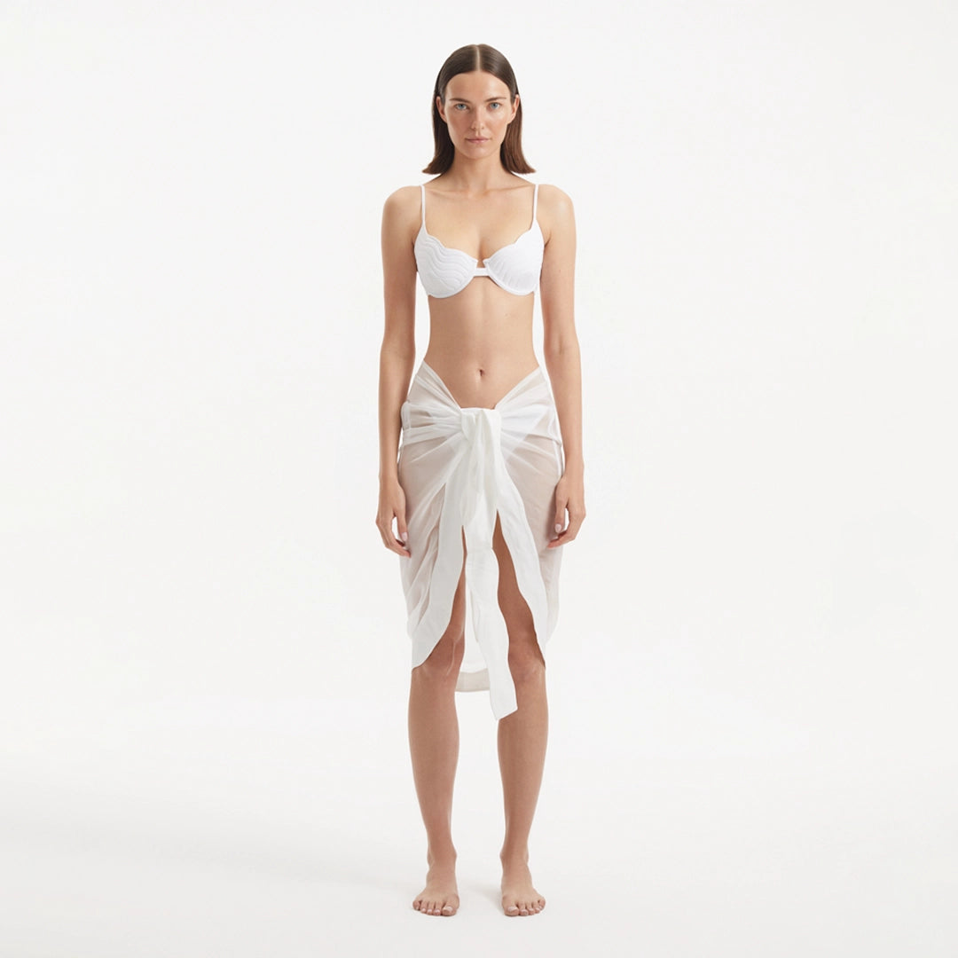 Raiden White Tie Front Wavy-Trim Sheer Sarong | Moeva | Sarongs | Each week unveils new pieces—luxury swimwear, fluid resort silhouettes, and elevated summer-to-evening essentials designed to carry you from coastal escapes to city nights.