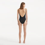 Muriel Black Scoop Neck Textured Swimsuit | Moeva | Swimsuit | Each week unveils new pieces—luxury swimwear, fluid resort silhouettes, and elevated summer-to-evening essentials designed to carry you from coastal escapes to city nights.