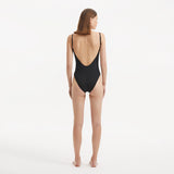 Muriel Black Scoop Neck Textured Swimsuit | Moeva | Swimsuit | Each week unveils new pieces—luxury swimwear, fluid resort silhouettes, and elevated summer-to-evening essentials designed to carry you from coastal escapes to city nights.