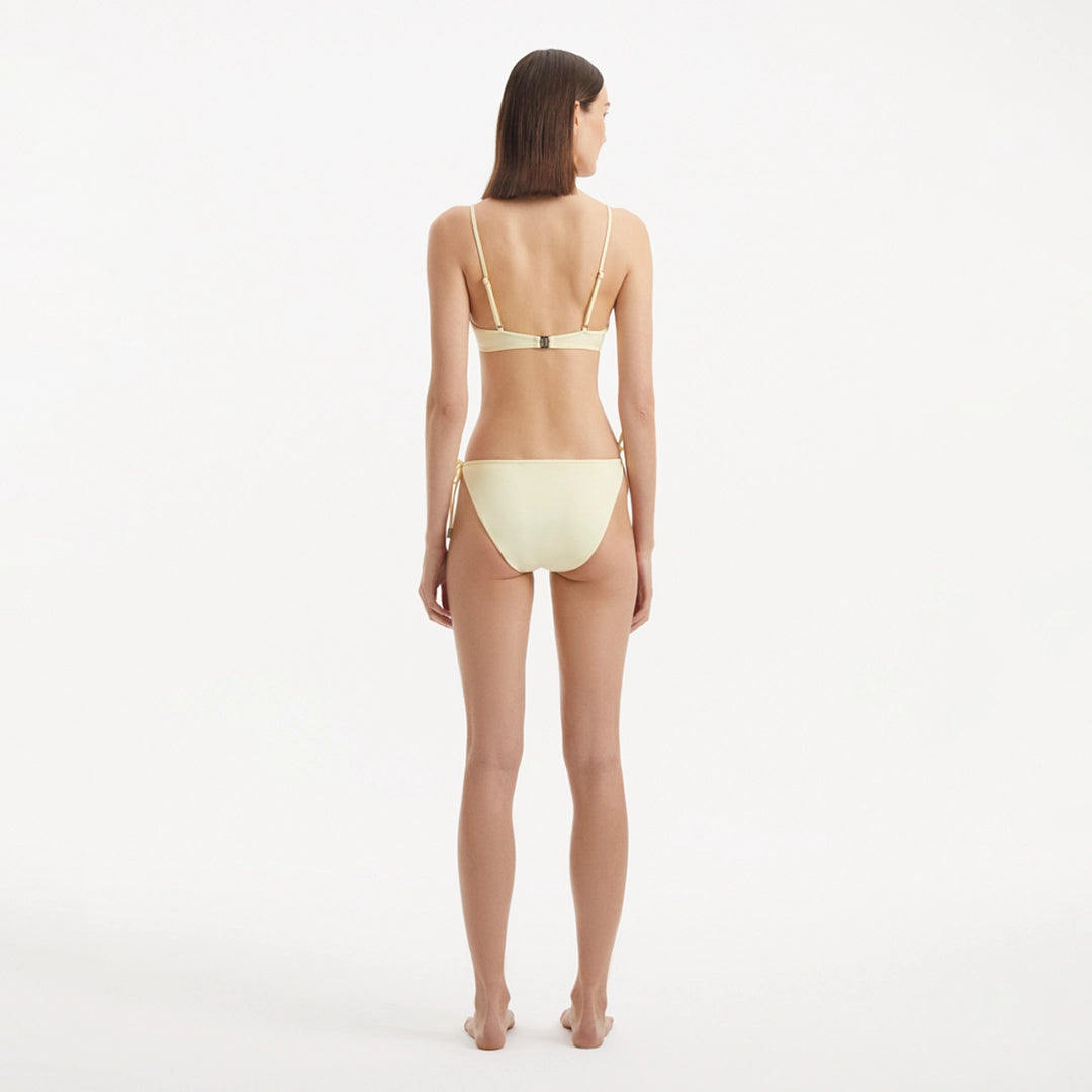 Salila Yellow Underwired Side Tie Wave Textured Bikini Set | Moeva | | Each week unveils new pieces—luxury swimwear, fluid resort silhouettes, and elevated summer-to-evening essentials designed to carry you from coastal escapes to city nights.