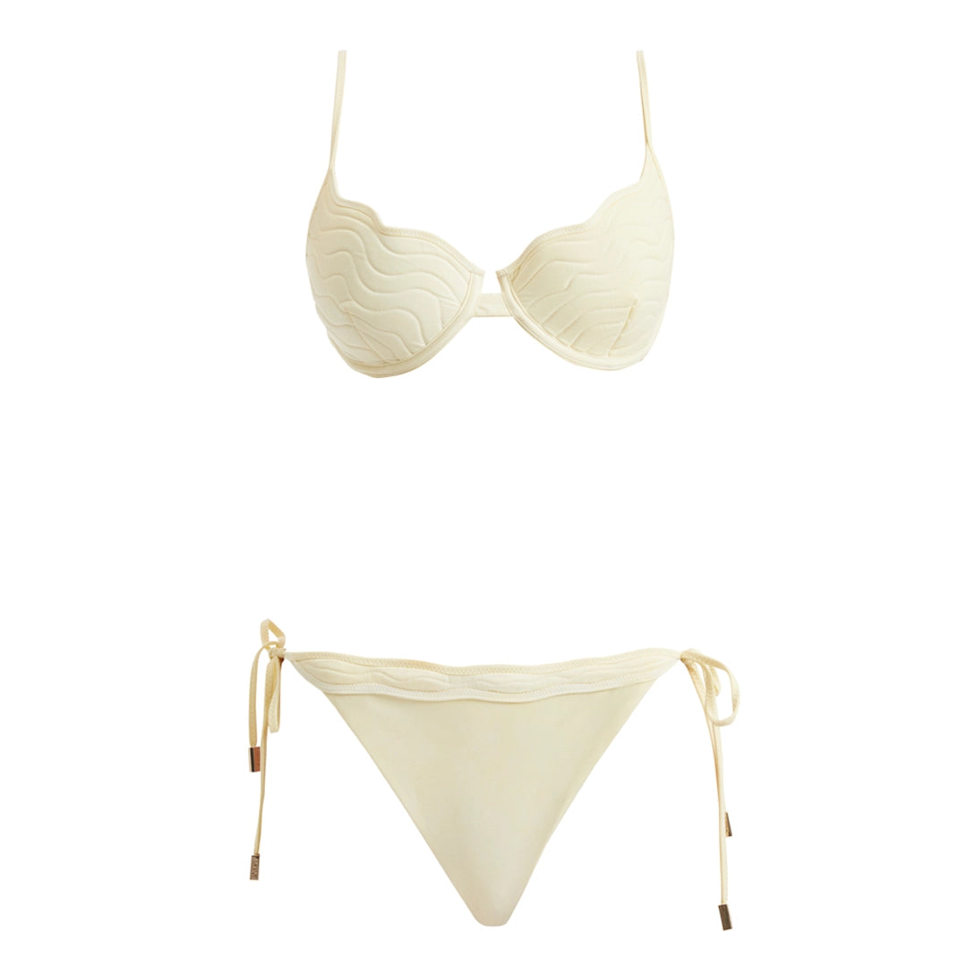 Salila Yellow Underwired Side Tie Wave Textured Bikini Set | Moeva | | Each week unveils new pieces—luxury swimwear, fluid resort silhouettes, and elevated summer-to-evening essentials designed to carry you from coastal escapes to city nights.