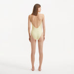 Muriel Yellow Scoop Neck Textured Swimsuit | Moeva | Swimsuit | Each week unveils new pieces—luxury swimwear, fluid resort silhouettes, and elevated summer-to-evening essentials designed to carry you from coastal escapes to city nights.