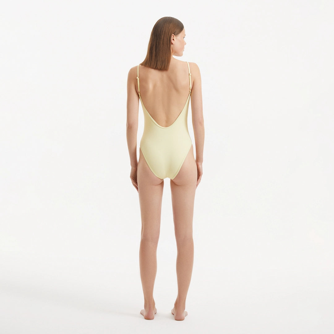 Muriel Yellow Scoop Neck Textured Swimsuit | Moeva | Swimsuit | Each week unveils new pieces—luxury swimwear, fluid resort silhouettes, and elevated summer-to-evening essentials designed to carry you from coastal escapes to city nights.