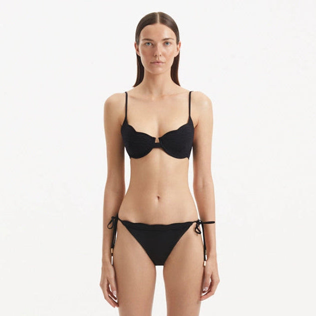 Salila Black Underwired Side Tie Wave Textured Bikini Set | Moeva | Bikini Set | Each week unveils new pieces—luxury swimwear, fluid resort silhouettes, and elevated summer-to-evening essentials designed to carry you from coastal escapes to city nights.