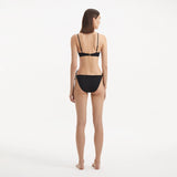 Salila Black Underwired Side Tie Wave Textured Bikini Set | Moeva | | Each week unveils new pieces—luxury swimwear, fluid resort silhouettes, and elevated summer-to-evening essentials designed to carry you from coastal escapes to city nights.