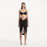 Raiden Black Tie Front Wavy-Trim Sheer Sarong | Moeva | Sarongs | Each week unveils new pieces—luxury swimwear, fluid resort silhouettes, and elevated summer-to-evening essentials designed to carry you from coastal escapes to city nights.
