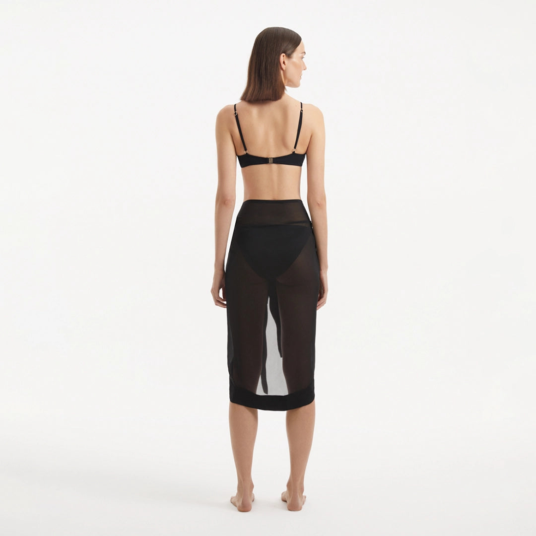 Raiden Black Tie Front Wavy-Trim Sheer Sarong | Moeva | Sarongs | Each week unveils new pieces—luxury swimwear, fluid resort silhouettes, and elevated summer-to-evening essentials designed to carry you from coastal escapes to city nights.