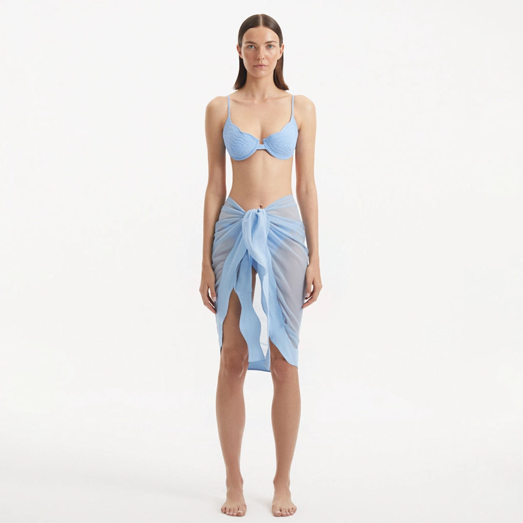 Raiden Baby Blue Tie Front Wavy-Trim Sheer Sarong | Moeva | Sarong | Each week unveils new pieces—luxury swimwear, fluid resort silhouettes, and elevated summer-to-evening essentials designed to carry you from coastal escapes to city nights.