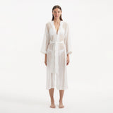 Blaze Long Sleeve Wavy-Trim Belted Sheer White Kaftan | Moeva | Kaftans | Each week unveils new pieces—luxury swimwear, fluid resort silhouettes, and elevated summer-to-evening essentials designed to carry you from coastal escapes to city nights.
