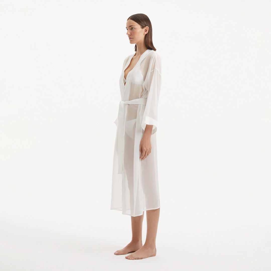 Blaze Long Sleeve Wavy-Trim Belted Sheer White Kaftan | Moeva | Kaftan | Each week unveils new pieces—luxury swimwear, fluid resort silhouettes, and elevated summer-to-evening essentials designed to carry you from coastal escapes to city nights.