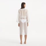 Blaze Long Sleeve Wavy-Trim Belted Sheer White Kaftan | Moeva | Kaftans | Each week unveils new pieces—luxury swimwear, fluid resort silhouettes, and elevated summer-to-evening essentials designed to carry you from coastal escapes to city nights.