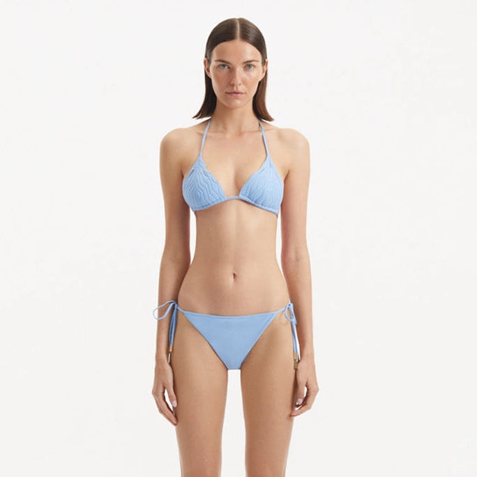 Sarita Baby Blue Triangle Wave Textured Side Tie Bikini Set | Moeva | Bikini Set | Each week unveils new pieces—luxury swimwear, fluid resort silhouettes, and elevated summer-to-evening essentials designed to carry you from coastal escapes to city nights.