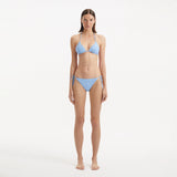 Sarita Baby Blue Triangle Wave Textured Side Tie Bikini Set | Moeva | | Each week unveils new pieces—luxury swimwear, fluid resort silhouettes, and elevated summer-to-evening essentials designed to carry you from coastal escapes to city nights.