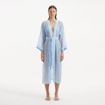 Blaze Long Sleeve Wavy-Trim Belted Sheer Baby Blue Kaftan | Moeva | Kaftans | Each week unveils new pieces—luxury swimwear, fluid resort silhouettes, and elevated summer-to-evening essentials designed to carry you from coastal escapes to city nights.