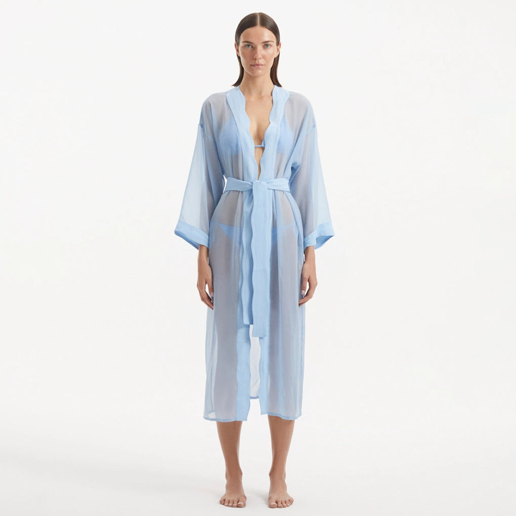 Blaze Long Sleeve Wavy-Trim Belted Sheer Baby Blue Kaftan | Moeva | Kaftan | Each week unveils new pieces—luxury swimwear, fluid resort silhouettes, and elevated summer-to-evening essentials designed to carry you from coastal escapes to city nights.
