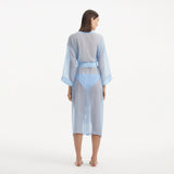 Blaze Long Sleeve Wavy-Trim Belted Sheer Baby Blue Kaftan | Moeva | Kaftans | Each week unveils new pieces—luxury swimwear, fluid resort silhouettes, and elevated summer-to-evening essentials designed to carry you from coastal escapes to city nights.