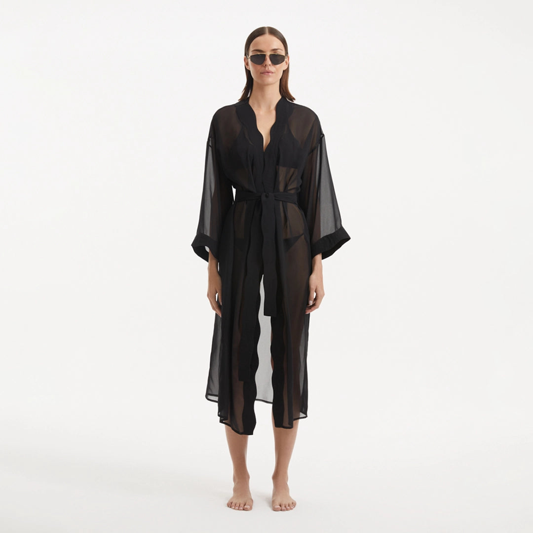 Blaze Long Sleeve Wavy-Trim Belted Sheer Black Kaftan | Moeva | Kaftans | Each week unveils new pieces—luxury swimwear, fluid resort silhouettes, and elevated summer-to-evening essentials designed to carry you from coastal escapes to city nights.