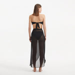 Xander Black Sheer Maxi Skirt with Gold Button Details | Moeva | Beachwear Skirts | Each week unveils new pieces—luxury swimwear, fluid resort silhouettes, and elevated summer-to-evening essentials designed to carry you from coastal escapes to city nights.