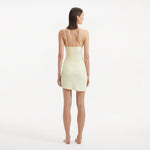 Antonia Yellow High-Waist Wrap Mini Skirt | Moeva | Beachwear Skirts | Each week unveils new pieces—luxury swimwear, fluid resort silhouettes, and elevated summer-to-evening essentials designed to carry you from coastal escapes to city nights.