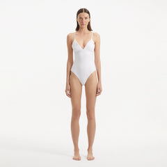 Anahita White V Neck Swimsuit | Moeva | Swimsuit | Each week unveils new pieces—luxury swimwear, fluid resort silhouettes, and elevated summer-to-evening essentials designed to carry you from coastal escapes to city nights.